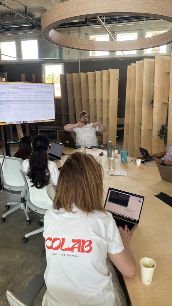 CoLab member in Building Together shirt at a workshop